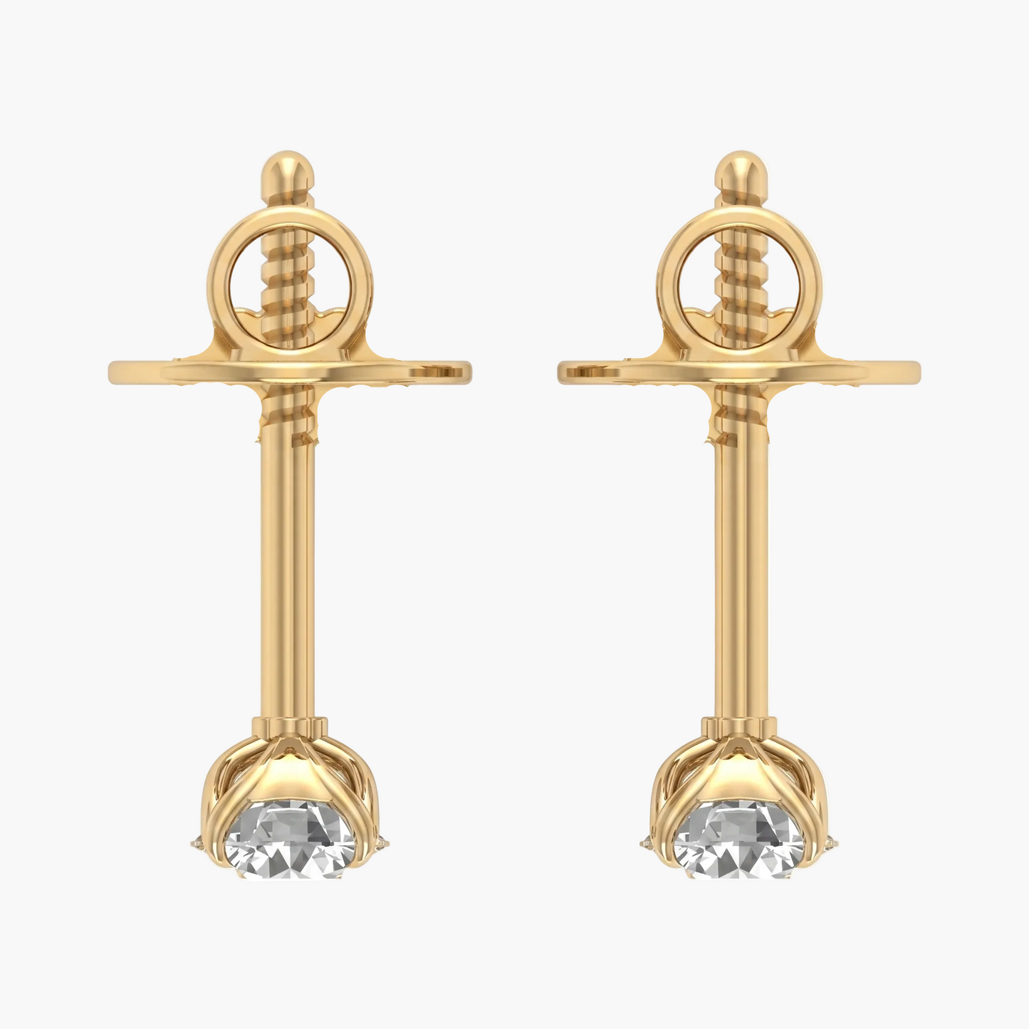 Gold earrings with clear gemstones on a white background
