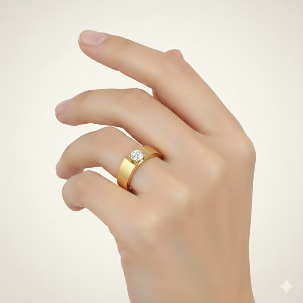 Gold ring with a diamond on a hand against a light background