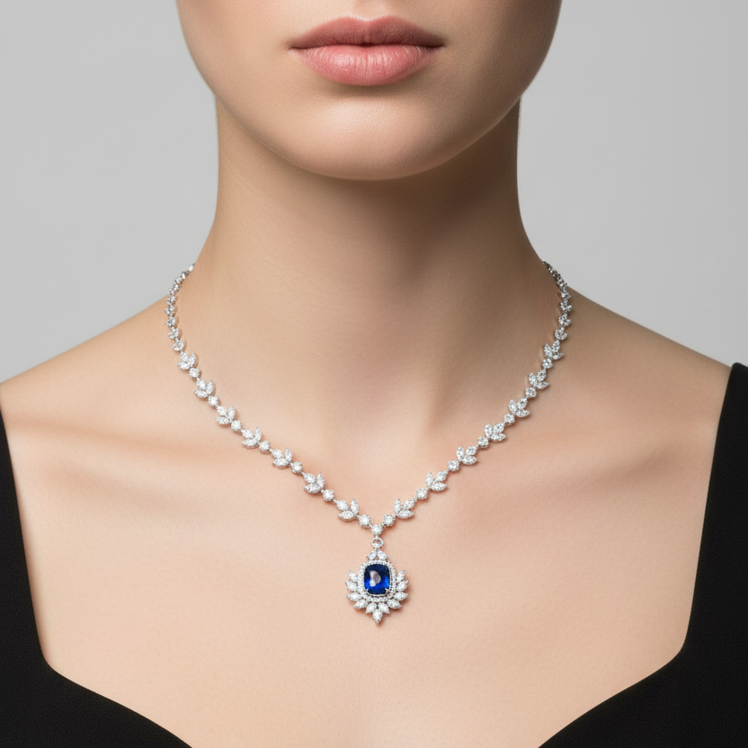 Female model wearing sapphire and diamond necklace