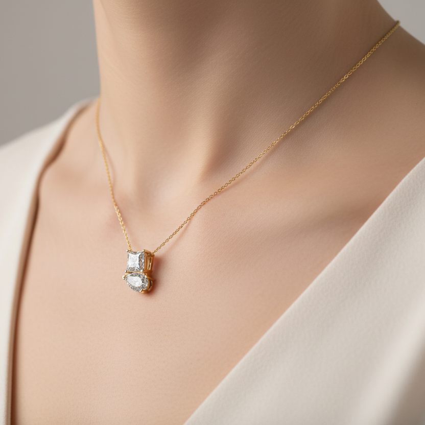 Generated image of a female model wearing the yellow gold toi et moi princess and pear diamond pendant