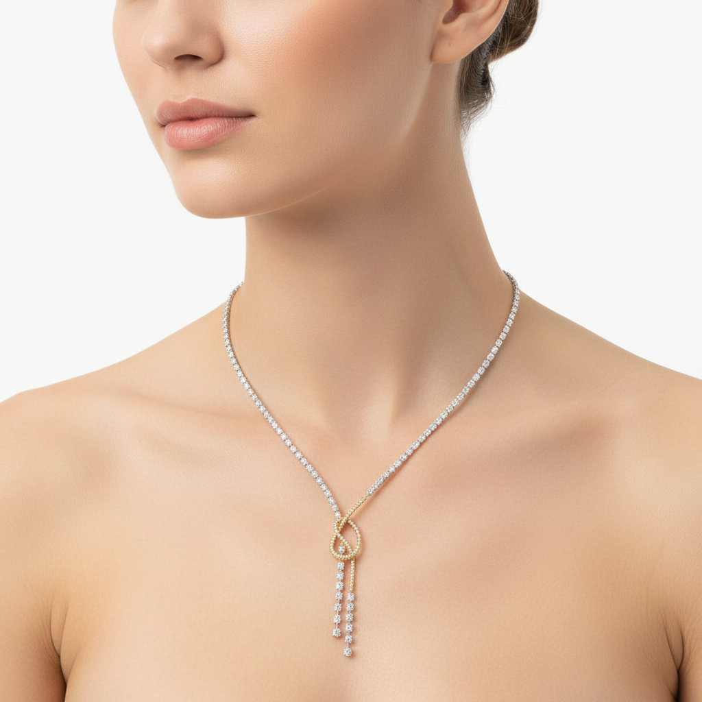 Two-tone diamond lariat necklace on model