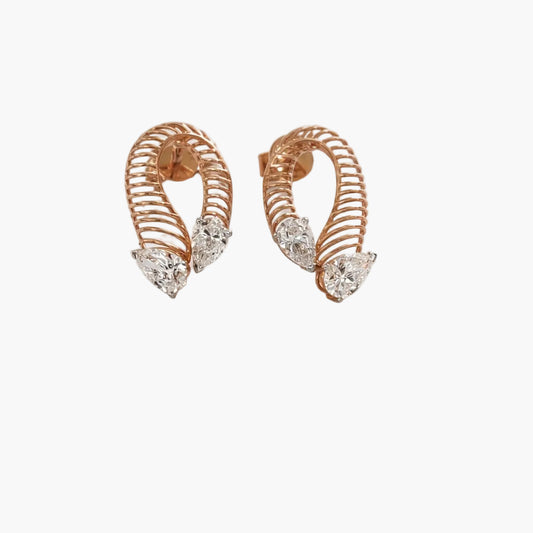 Rose gold hoop earrings with clear gemstones on a white background