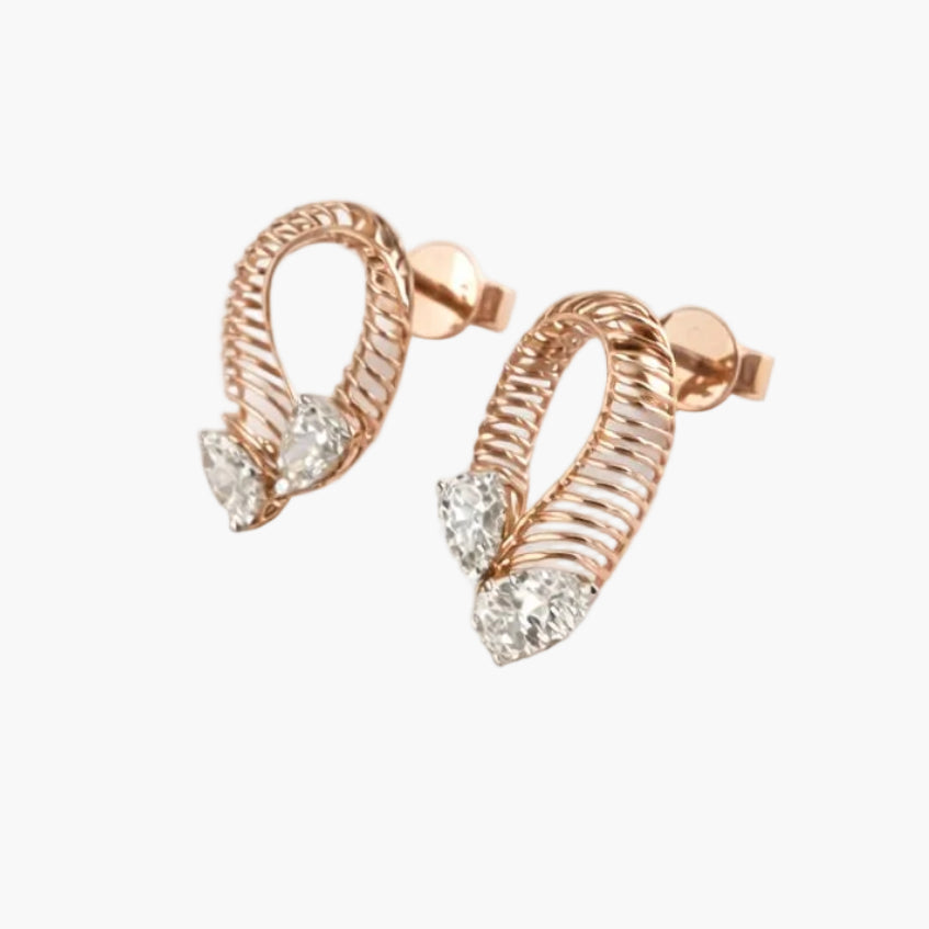 Rose gold hoop earrings with clear gemstones on a white background