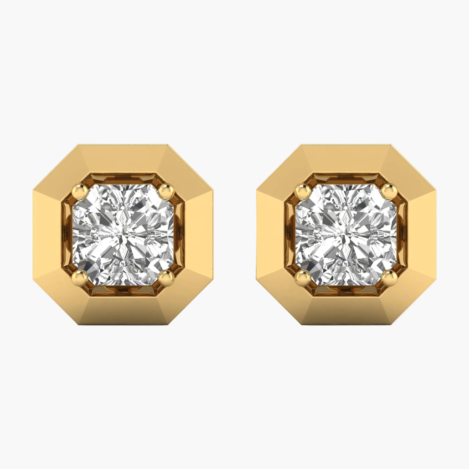 Gold hexagonal earrings with clear gemstones on a white background