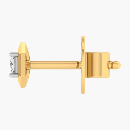 Gold earring on a white background