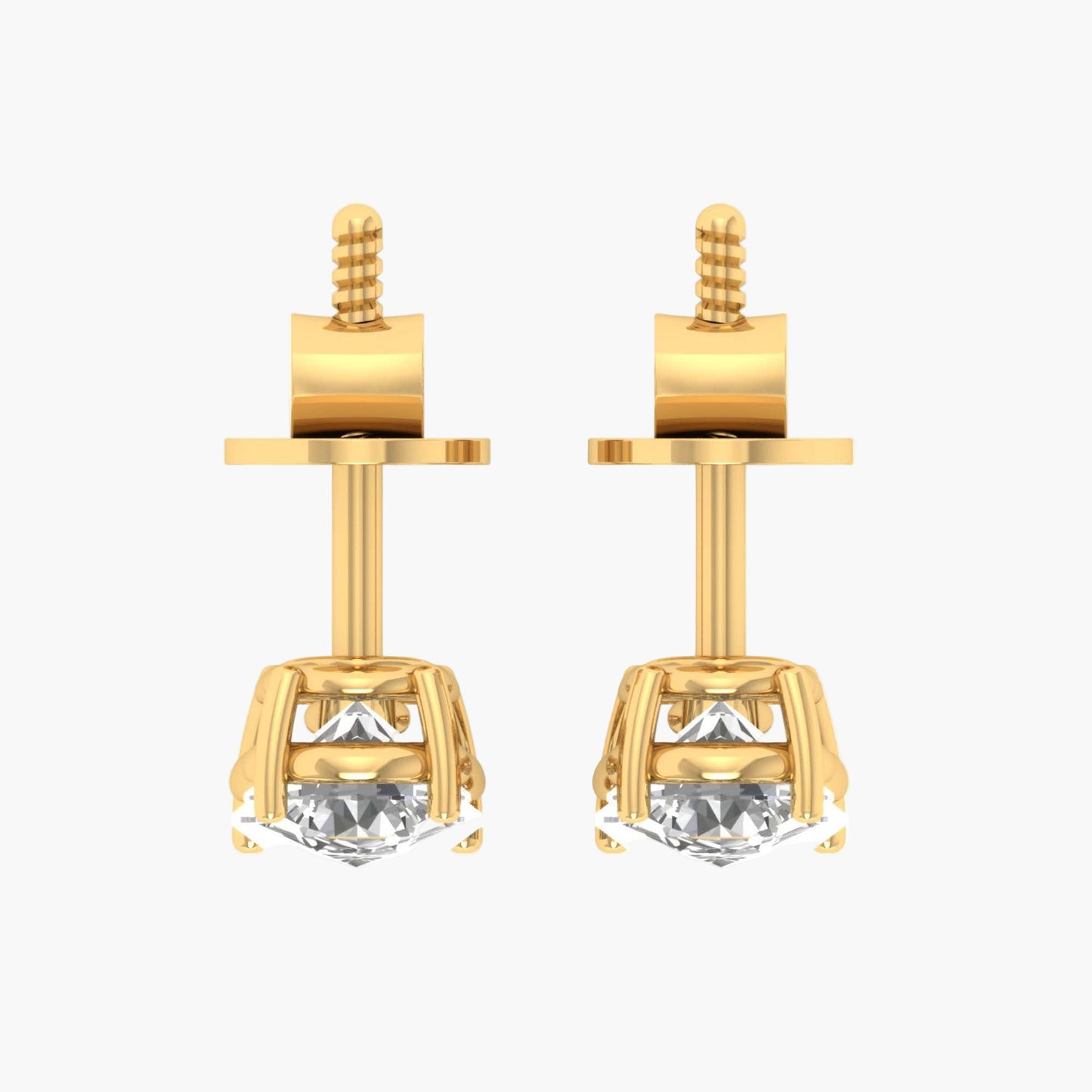 Gold earrings with clear gemstones on a white background