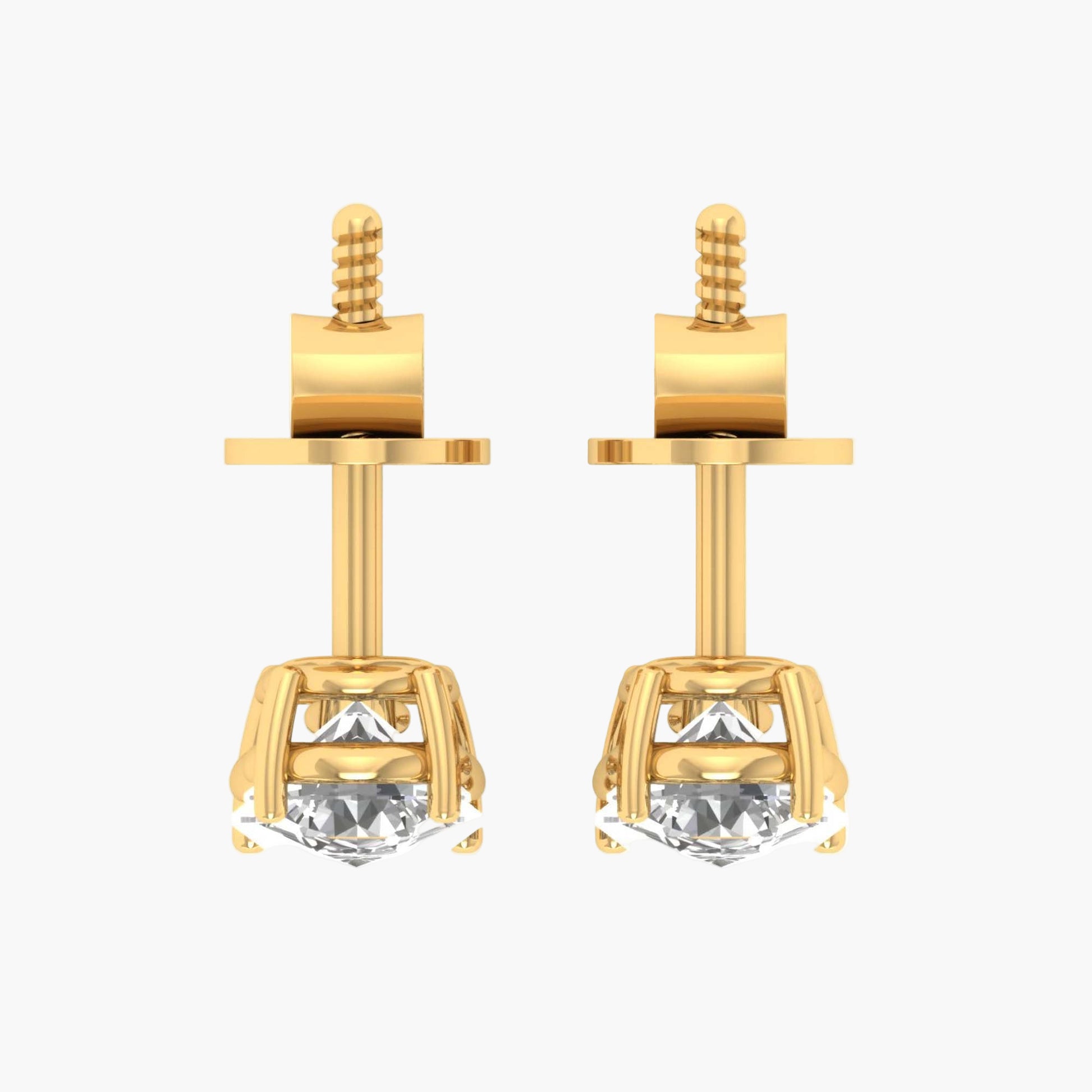 Gold earrings with clear gemstones on a white background