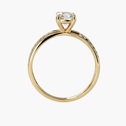 Gold ring with a diamond on a white background