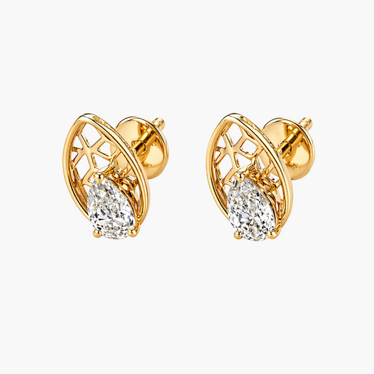 Gold earrings with clear gemstones on a white background