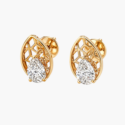 Gold earrings with diamond-like stones on a white background