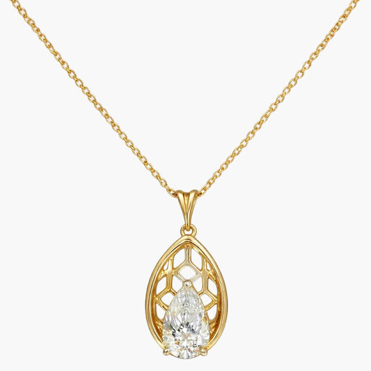 Gold necklace with a teardrop-shaped pendant on a white background
