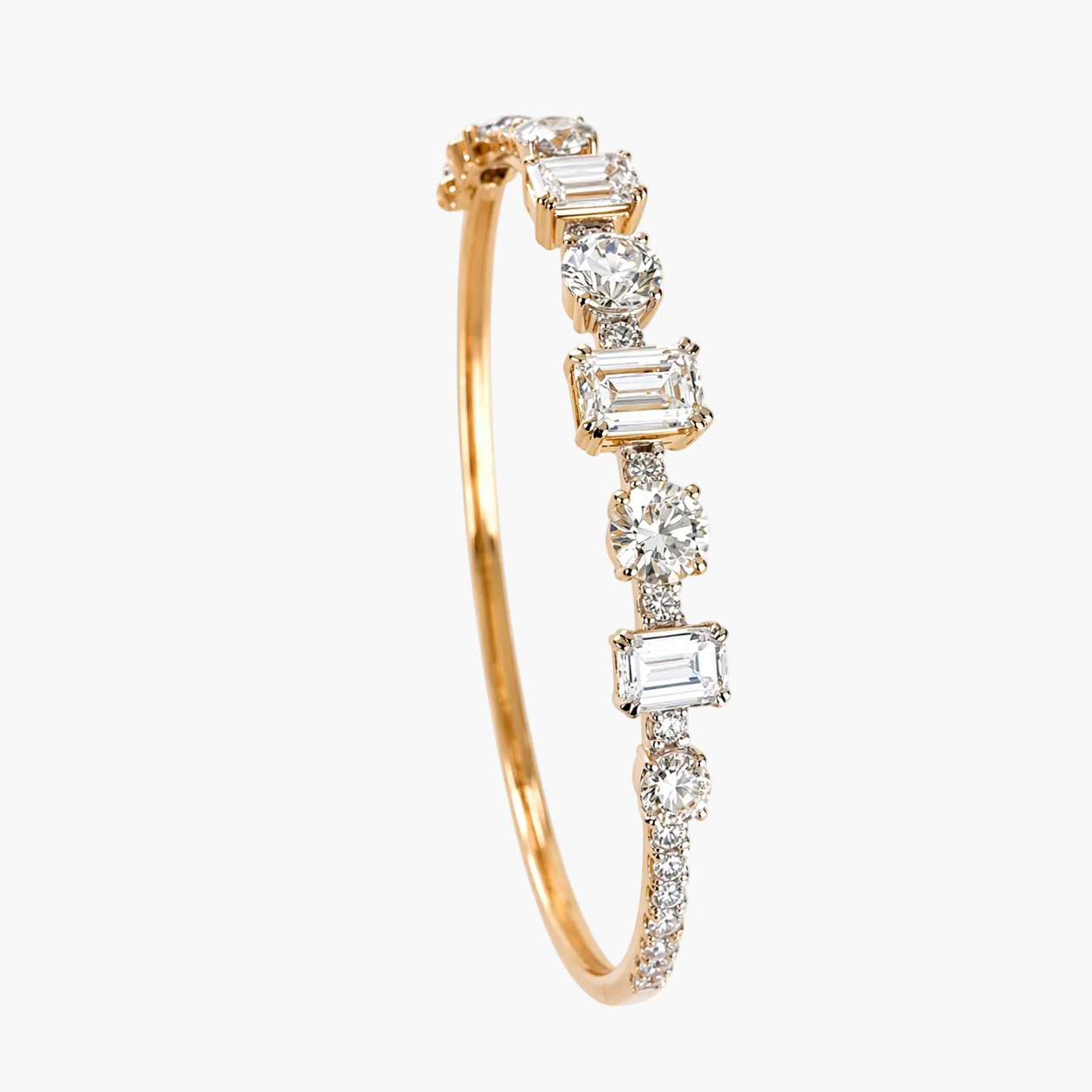 Gold bracelet with diamond accents on a white background