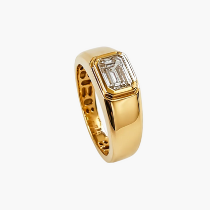 Gold ring with a diamond on a white background