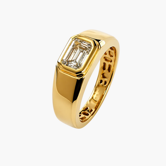 Gold ring with a diamond on a white background