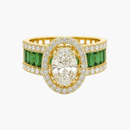 Gold ring with central diamond and emerald stones on a white background