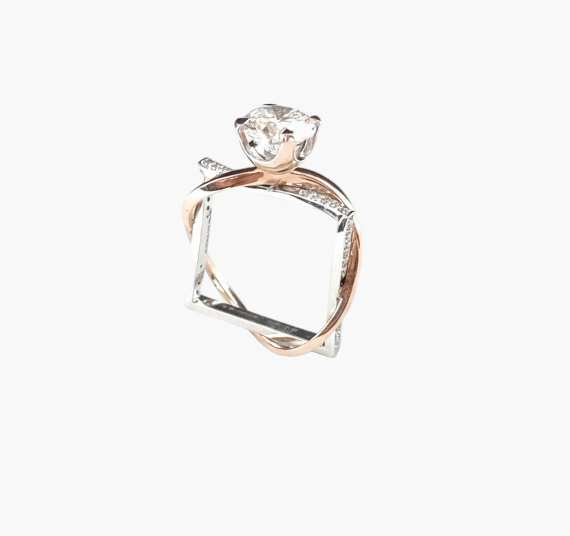 Two-tone diamond ring on a white background