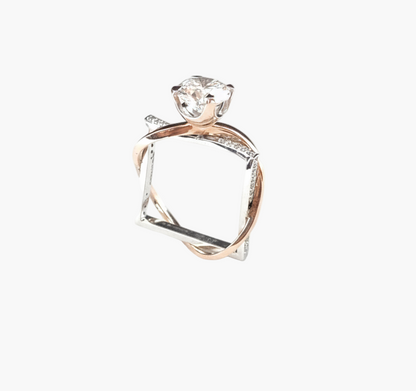 Two-tone diamond ring on a white background