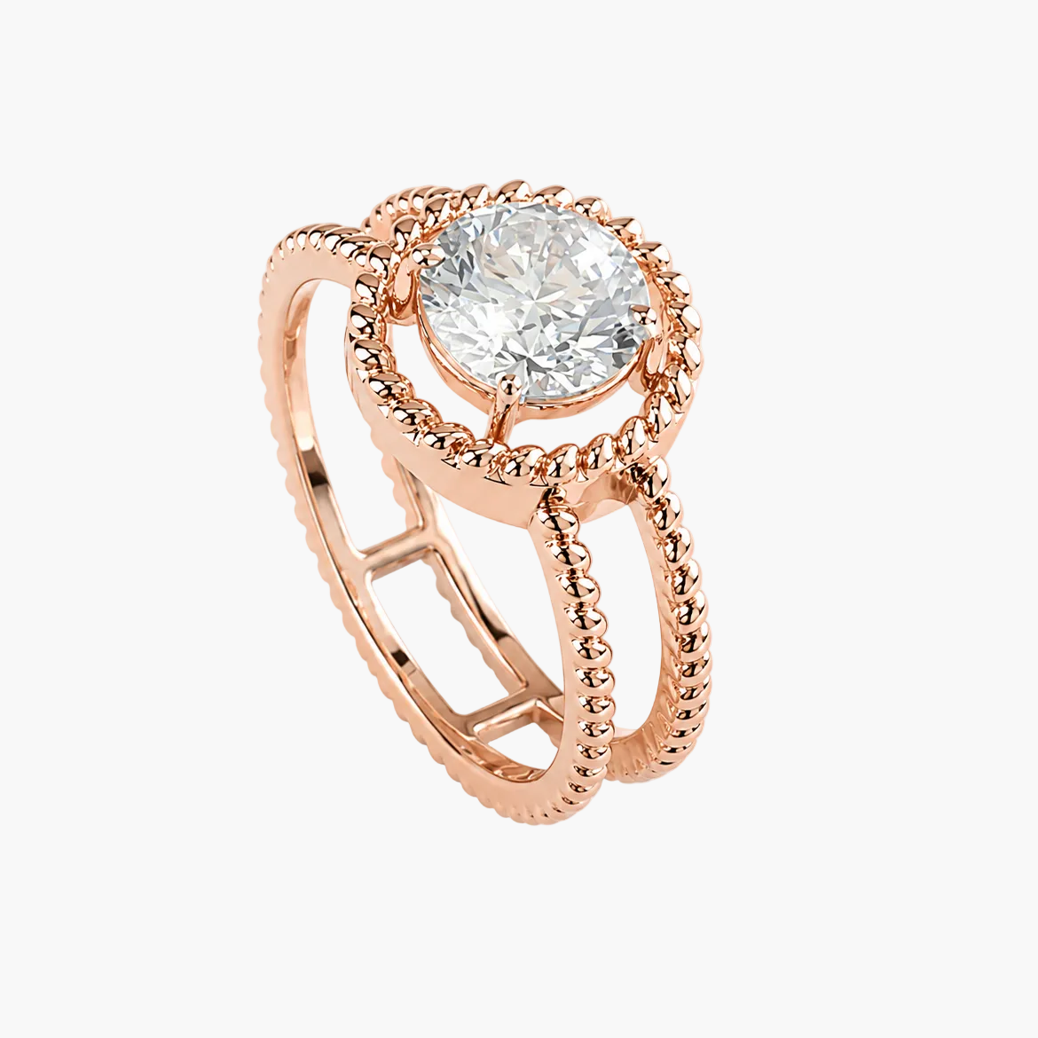 Rose gold ring with a diamond on a white background