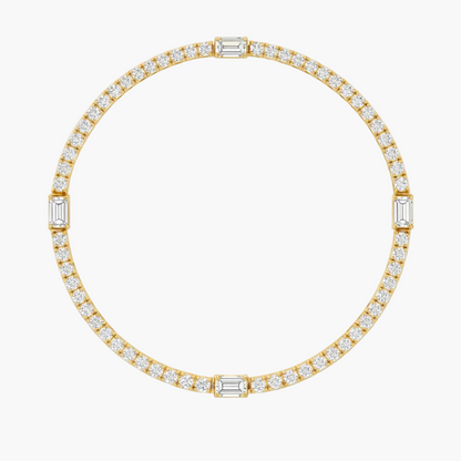 Gold bracelet with diamond accents on a white background