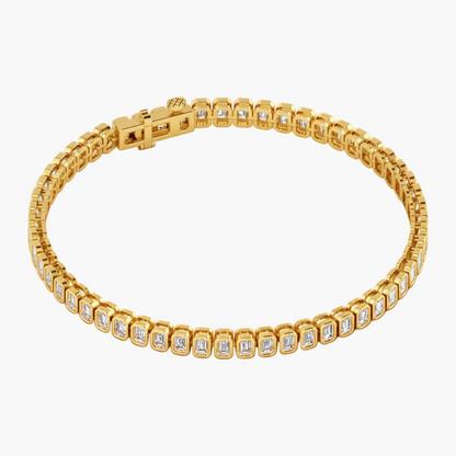 Gold bracelet with diamond accents on a white background