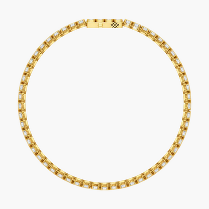 Gold bracelet with diamond accents on a white background