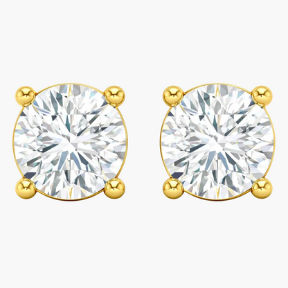 Gold earrings with round clear gemstones on a white background