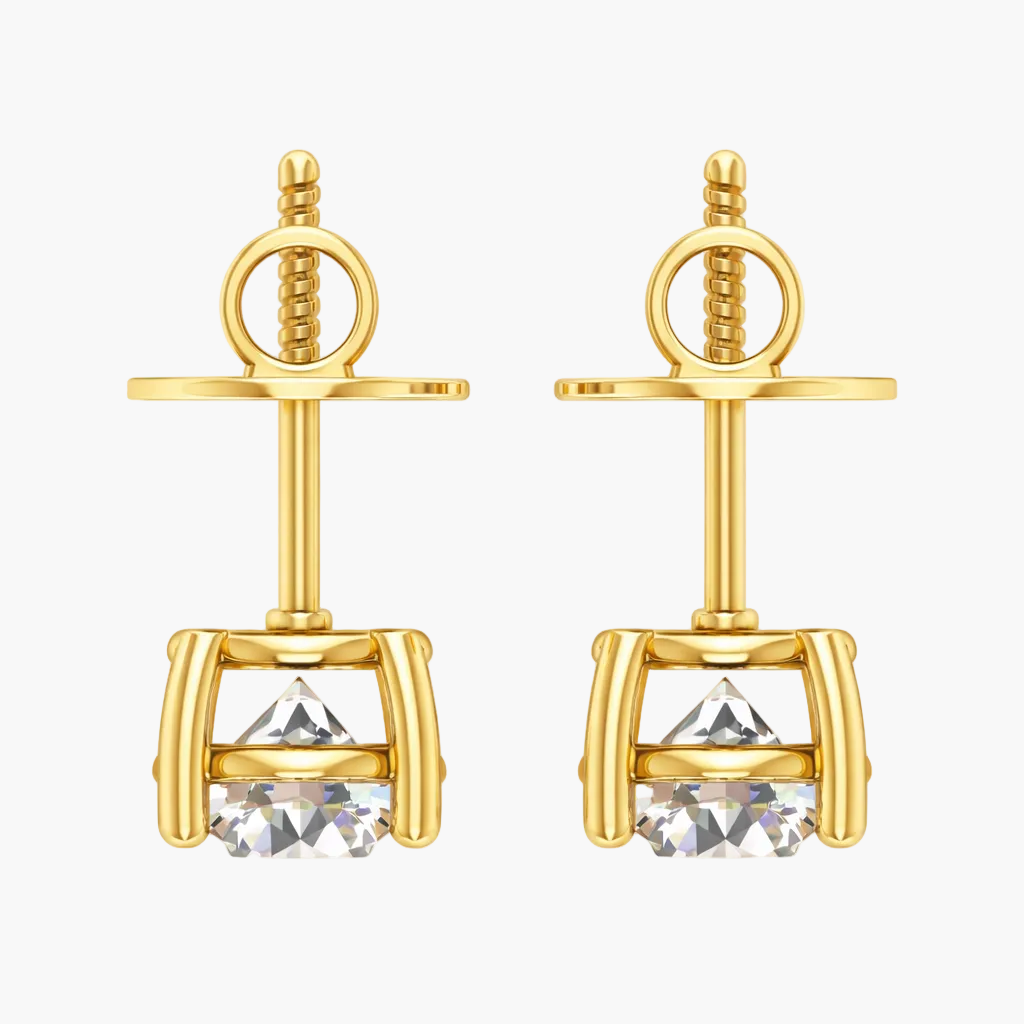 Gold earrings with clear gemstones on a white background