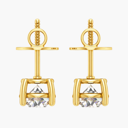 Gold earrings with clear gemstones on a white background