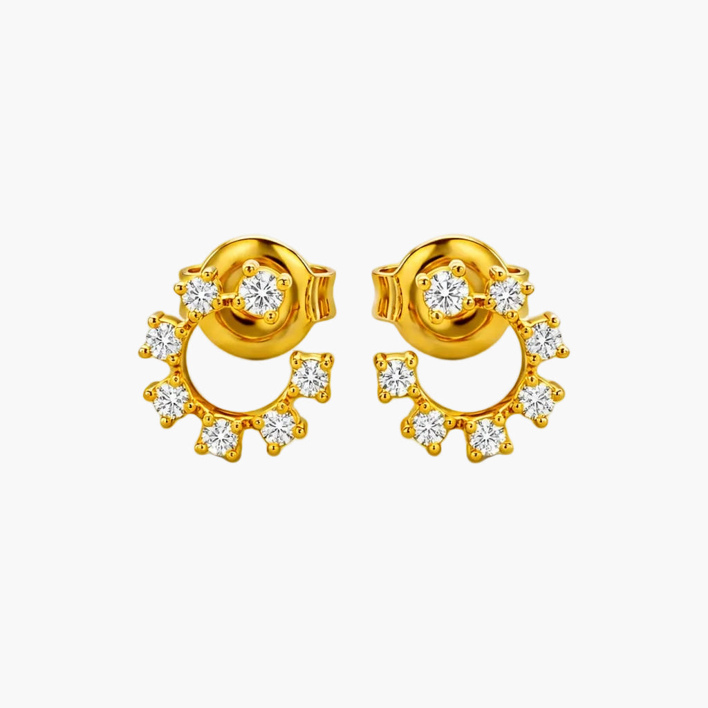 Gold earrings with diamond accents on a white background