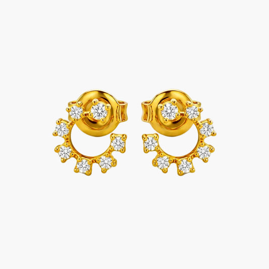 Gold earrings with diamond accents on a white background