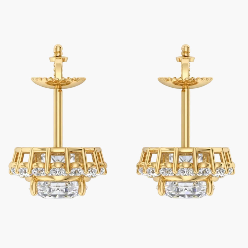 Gold earrings with clear gemstones on a white background