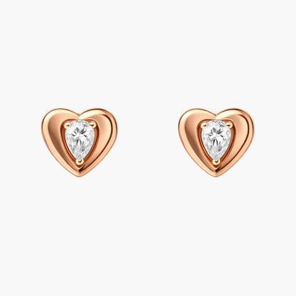 Heart-shaped earrings with clear gemstones on a white background