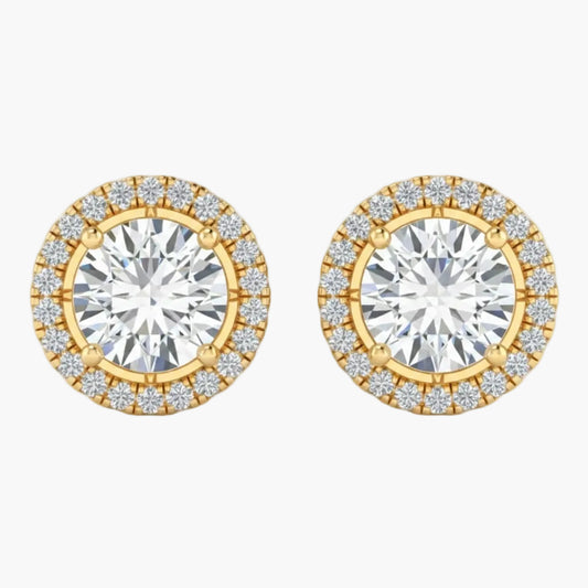 Gold and diamond stud earrings on a white background