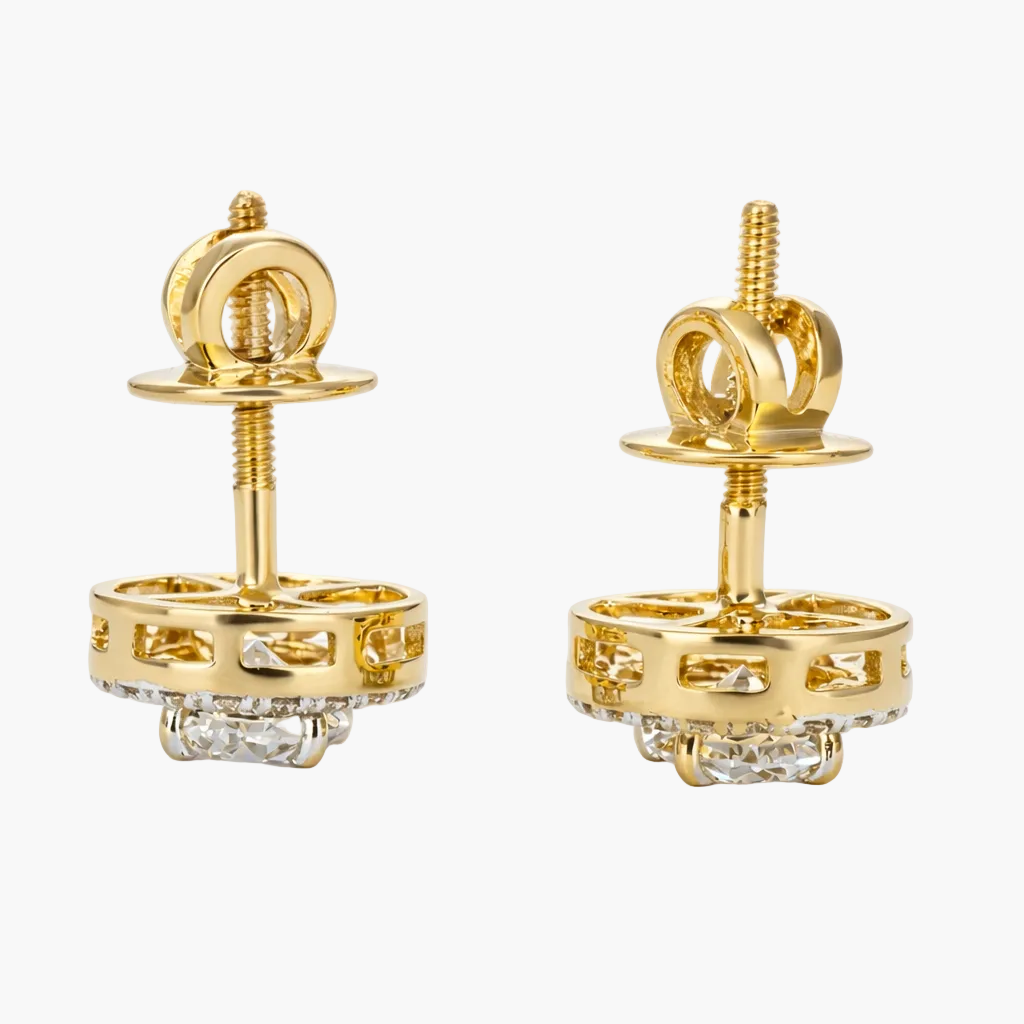 Pair of gold earrings on a white background