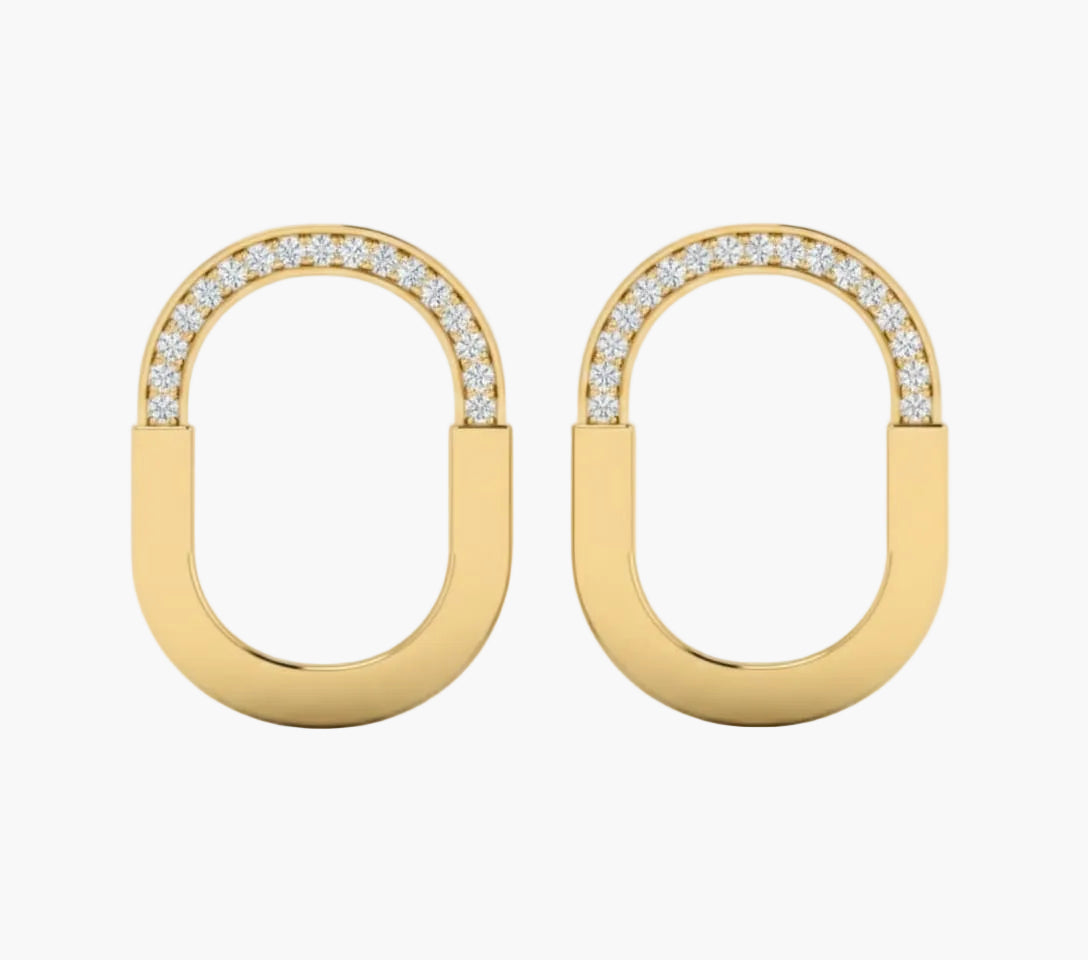 Gold hoop earrings with diamond accents on a white background