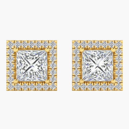 Pair of square diamond earrings with gold frames on a white background