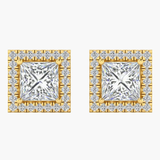 Pair of square diamond earrings with gold frames on a white background