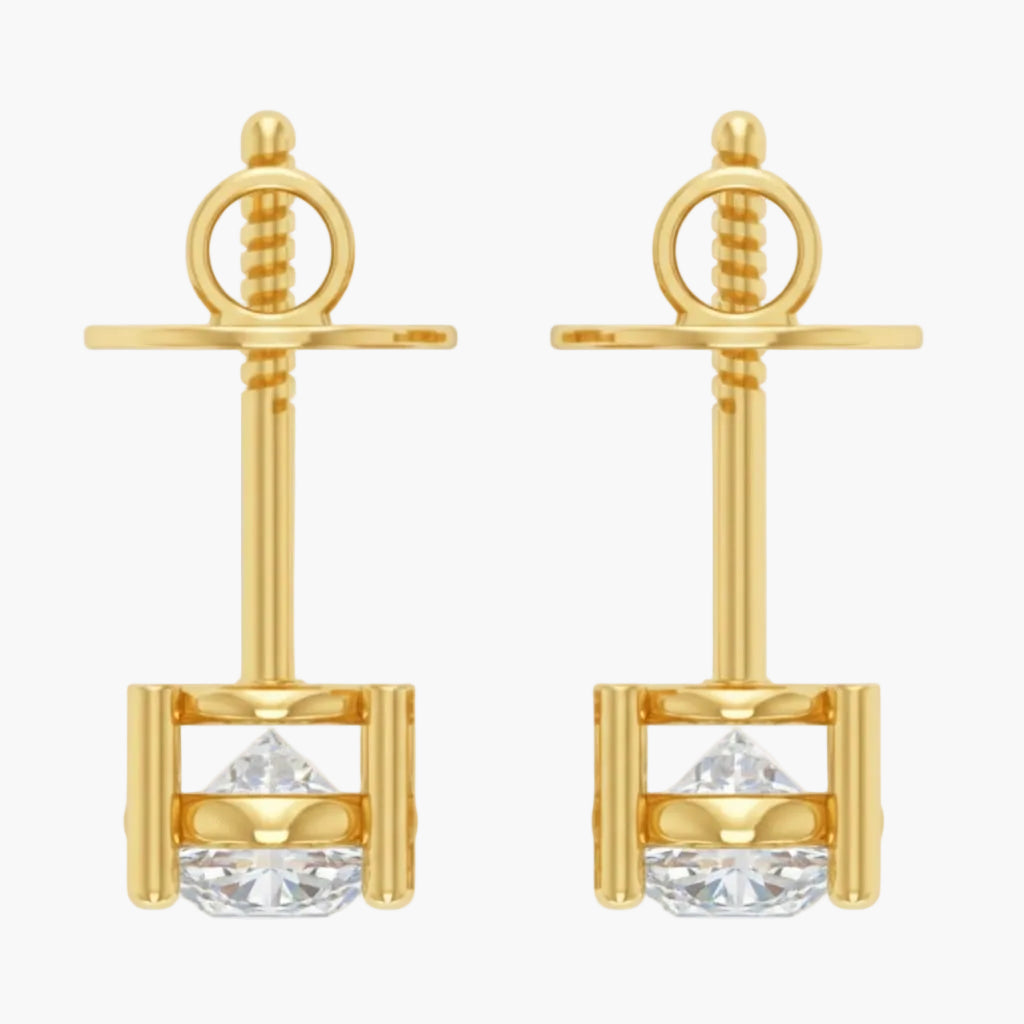 Gold earrings with clear gemstones on a white background