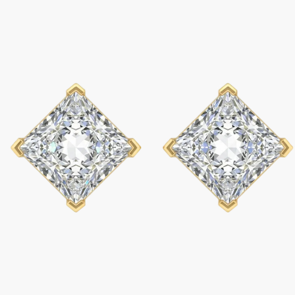 Pair of diamond earrings with gold prongs on a white background