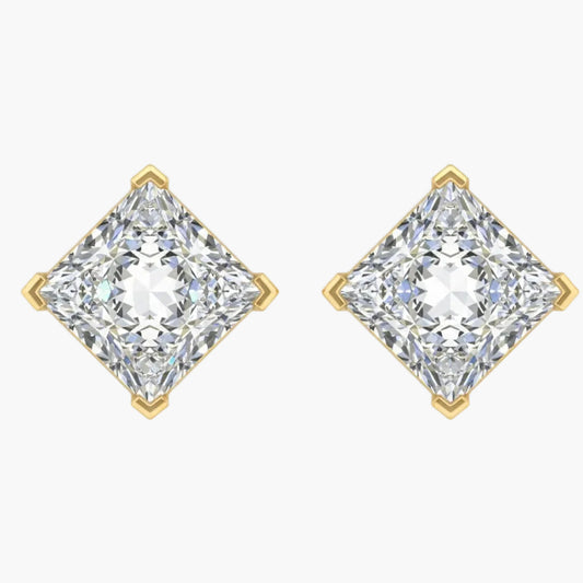 Pair of diamond earrings with gold prongs on a white background