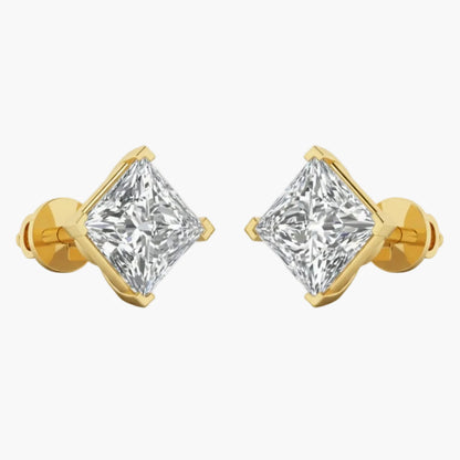 Gold earrings with clear gemstones on a white background
