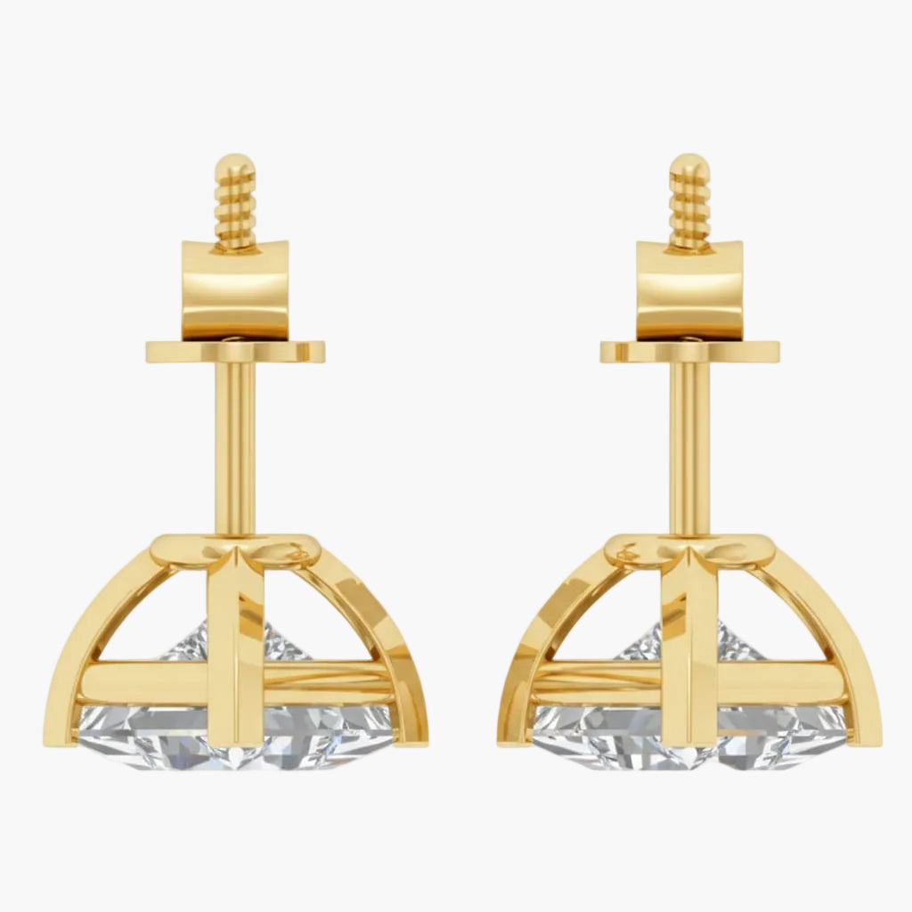 Gold earrings with clear gemstones on a white background