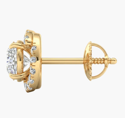 Gold earring with clear gemstones on a white background
