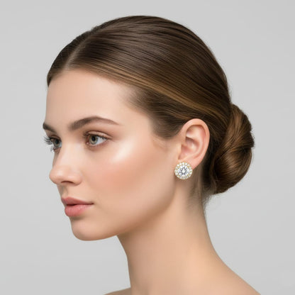 Woman wearing a diamond earring with a gray background