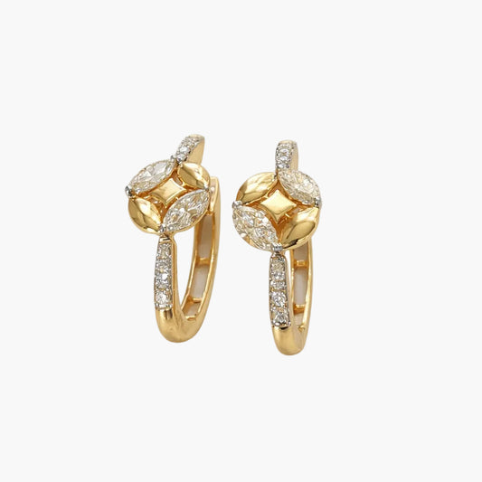 Gold earrings with diamond accents on a white background