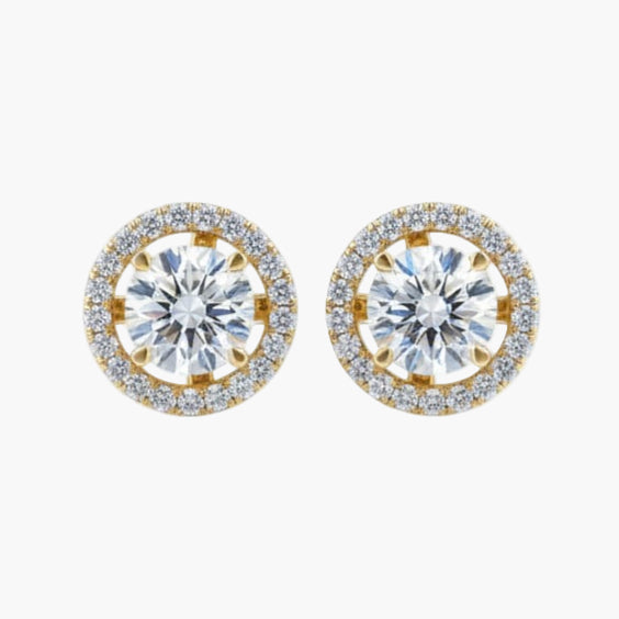 Gold and diamond stud earrings on a white background