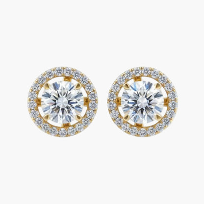 Gold and diamond stud earrings on a white background