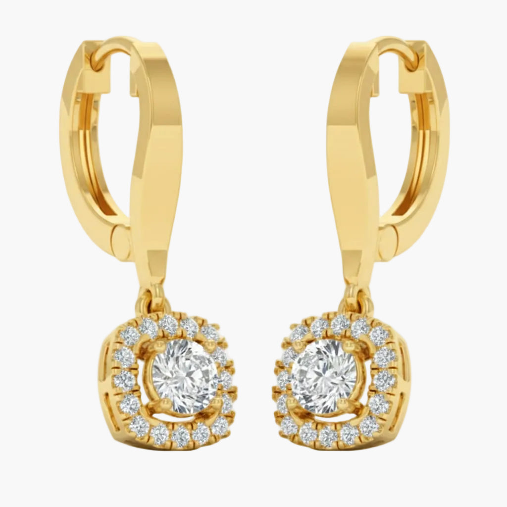 Gold hoop earrings with diamond accents on a white background