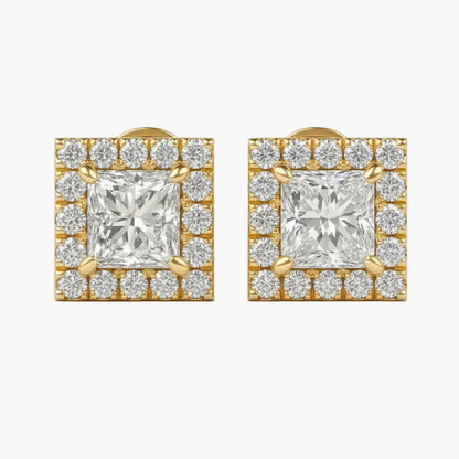 Pair of diamond earrings with gold accents on a white background