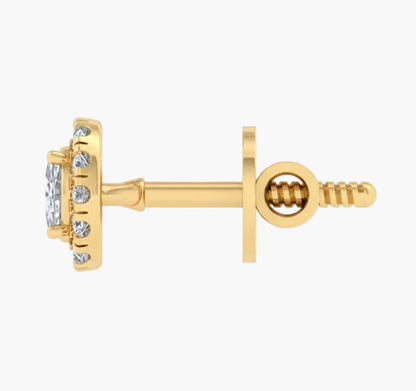 Gold earring on a white background